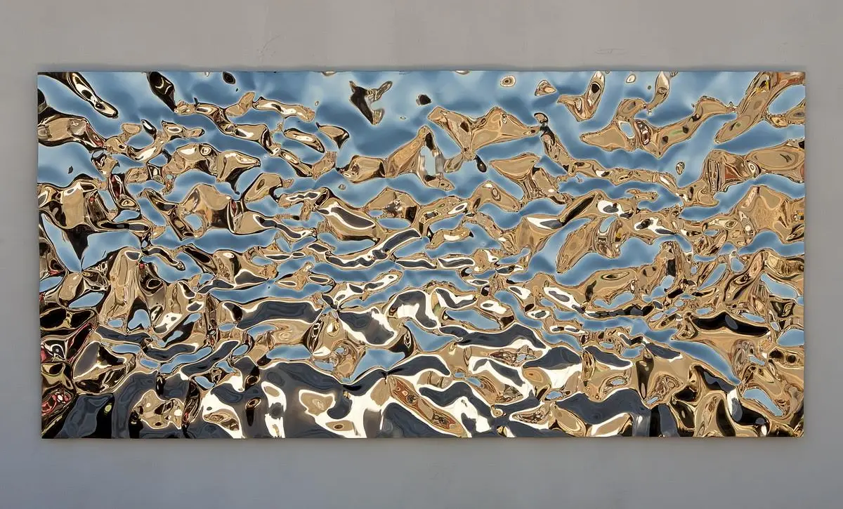 "Landscapes" installed on a neutral wall, viewed from below, emphasising the work's scale and horizon-like bands.